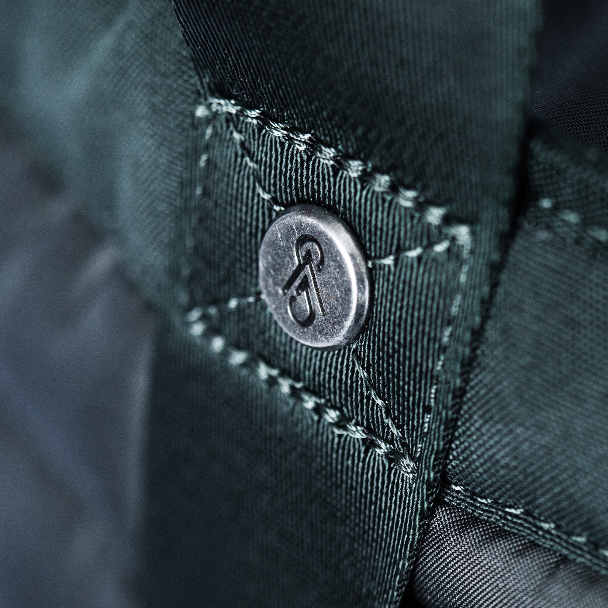 metal rivet detail on tote bag